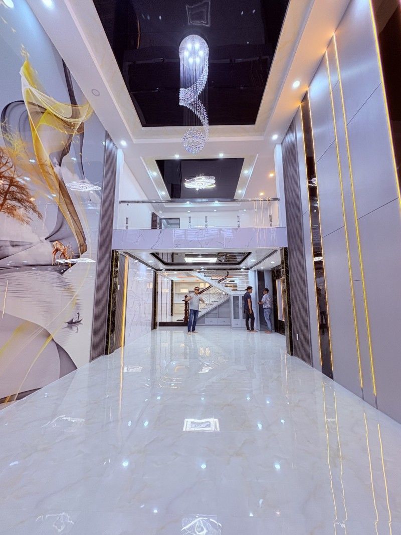 Bán Nhà Đẹp Mặt Tiền 100m2 5 Tầng Ngang 6m 15.x tỷ Trần Văn Quang